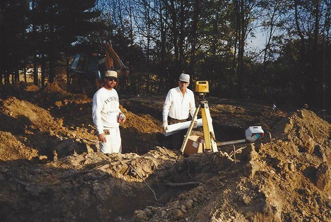 Two Workers Planning — Plymouth, IN — Creed Septic System Specialist