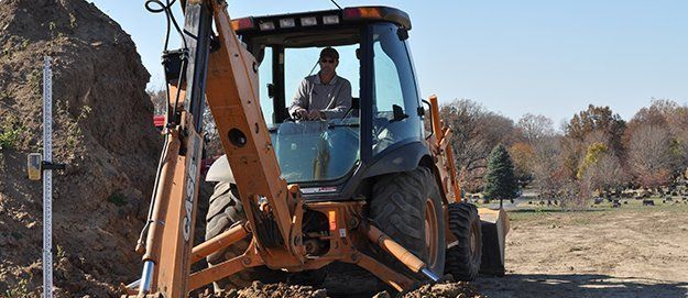 Man on Excavator Truck — Plymouth, IN — Creed Septic System Specialist