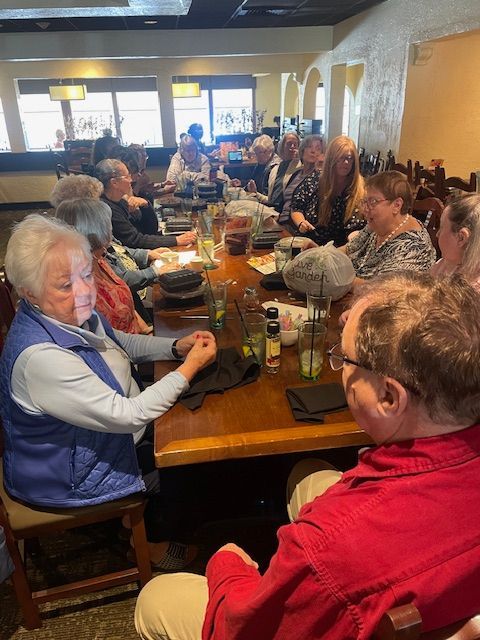 A group from Camp Ground gathers for lunch