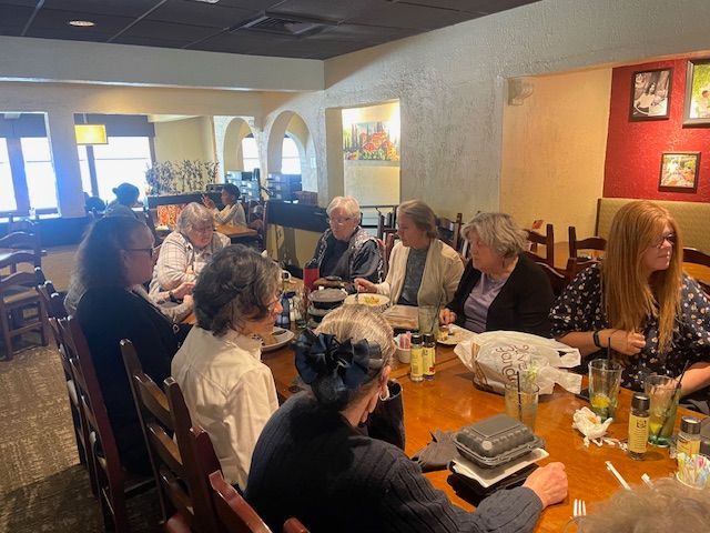 A group from Campground gathers for lunch at Olive Garden
