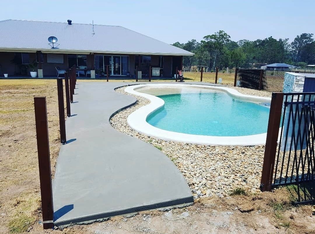 A Concrete Walkway is Being Built in a Construction Site — TJ Concreting in Myocum, NSW