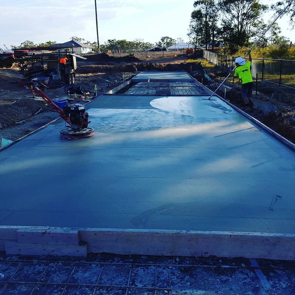 A Concrete Surface is Being Worked on With a Machine — TJ Concreting in Bangalow, NSW