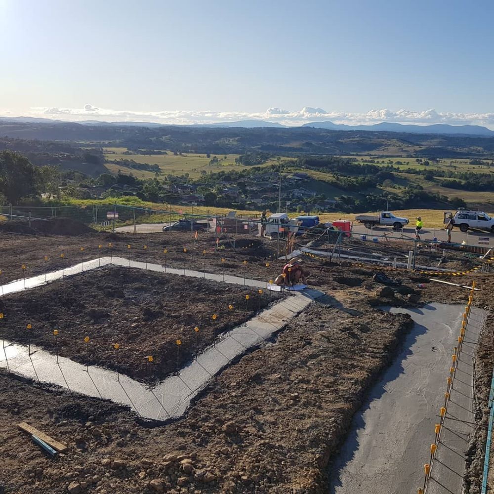 An Aerial View of a Construction Site With a Landscape in the Background — TJ Concreting in Myocum, NSW