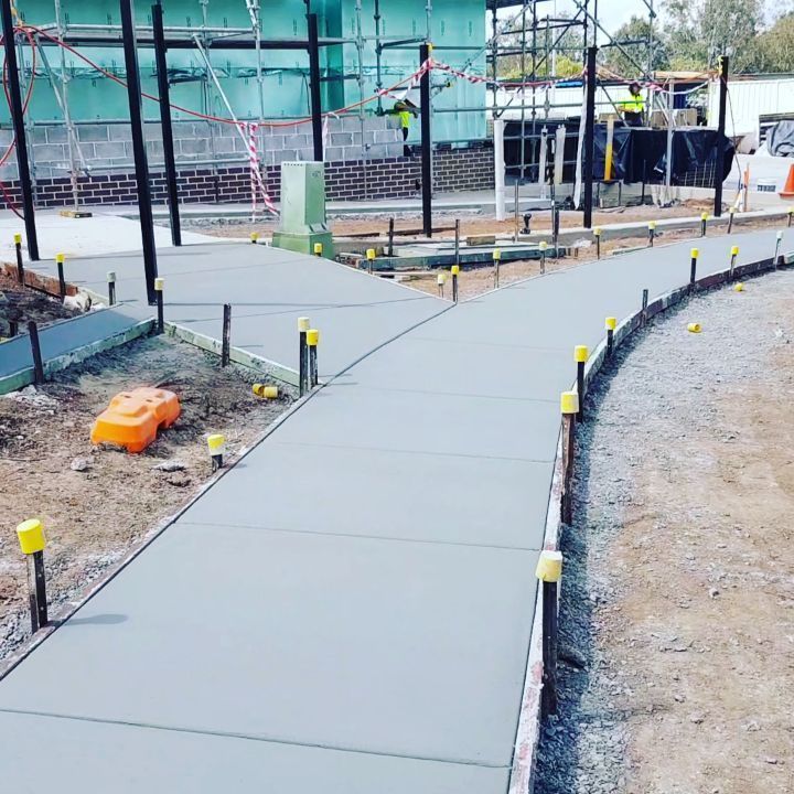 A Concrete Walkway is Being Built in a Construction Site — TJ Concreting in Myocum, NSW
