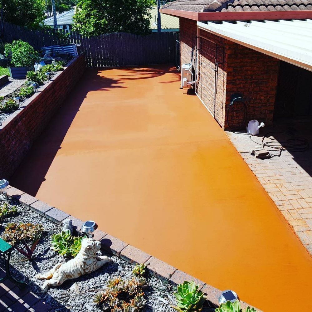A Concrete Patio in Front of a House — TJ Concreting in Myocum, NSW
