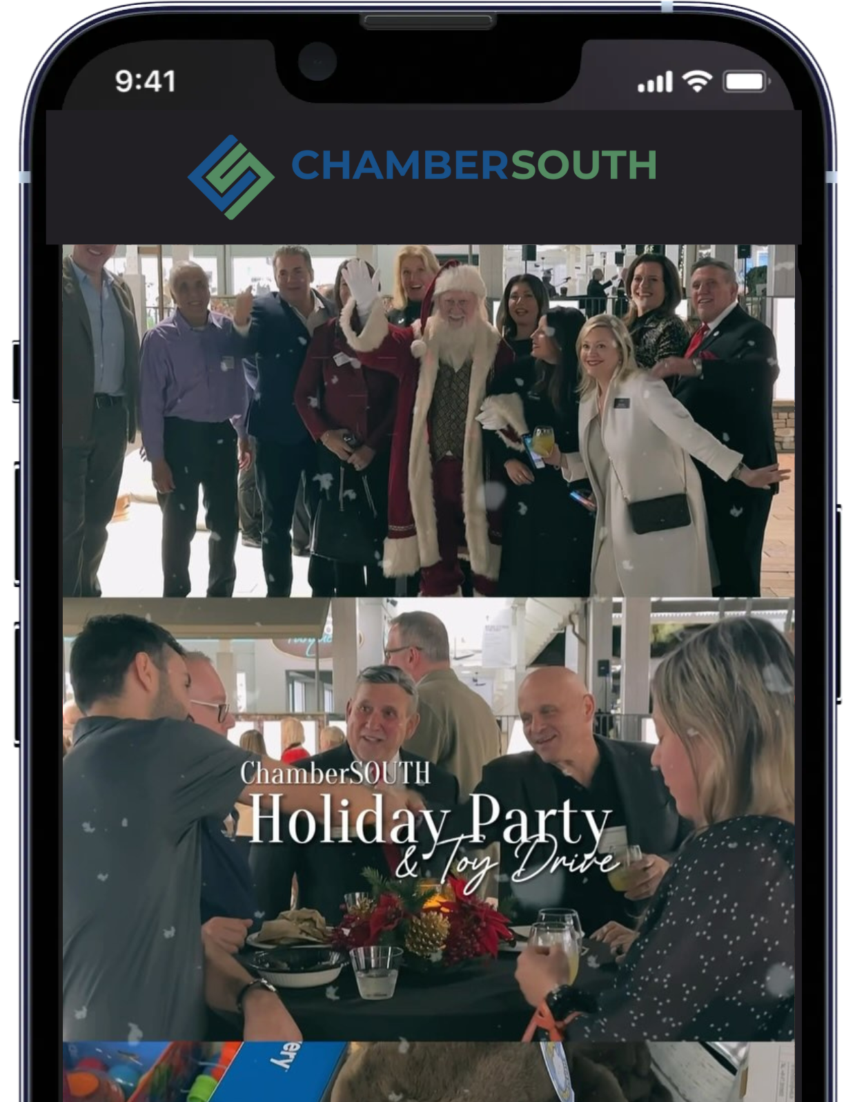 A cell phone with a picture of a holiday party on the screen.