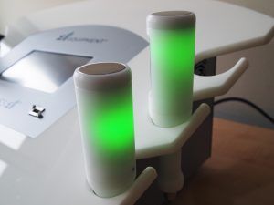 Waves 21 therapy device with green LED light – used for neuromuscular stimulation and body treatment.