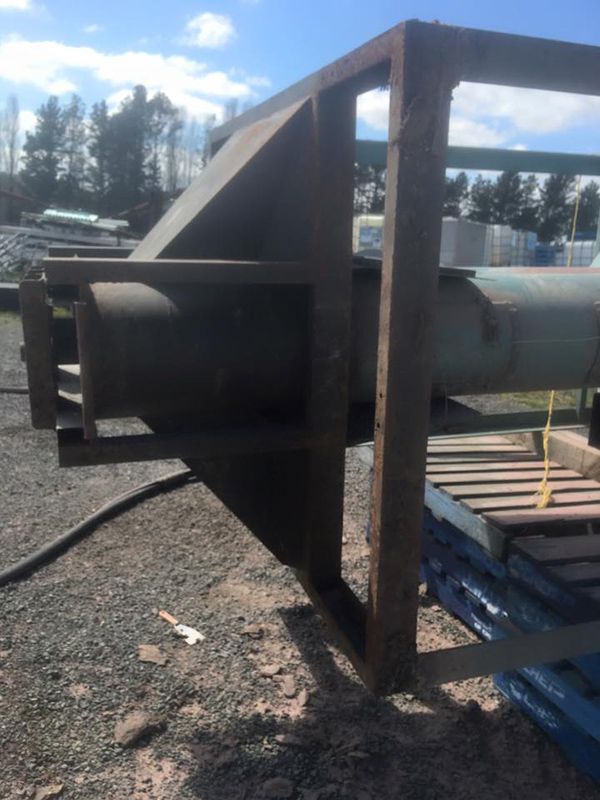 A Large Piece of Metal Is Sitting on The Ground Before Painting — ASSB Armidale Sand & Soda Blasting In Guyra, NSW