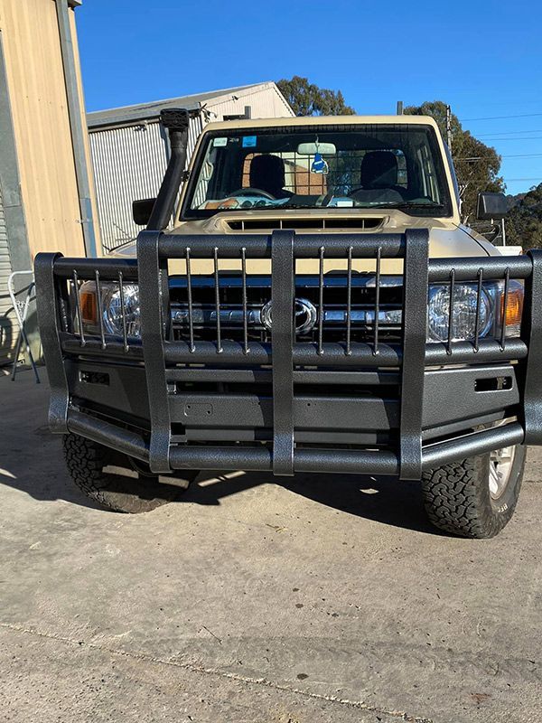 A Truck with A Black Bumper Is Parked on The Side of The Road — ASSB Armidale Sand & Soda Blasting In  Armidale, NSW