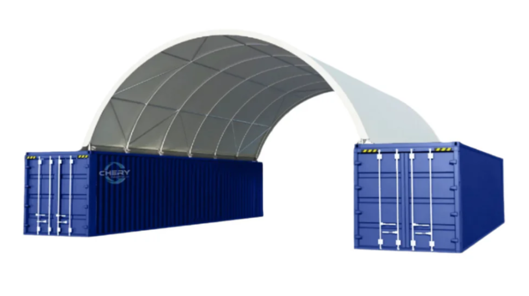 Covered storage solution showing blue shipping containers under a curved metal canopy structure for equipment and vehicle protection