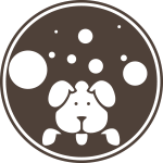 A dog is sitting in a circle with bubbles around it.