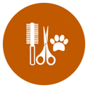 A pair of scissors , a comb , and a paw print in a circle.