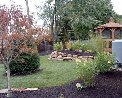 Quality landscaping of a backyard in Sagamore Hills