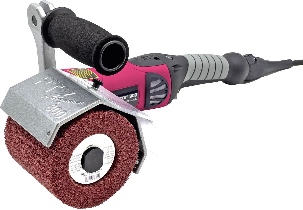 A close up of a projector on a stand on a table.