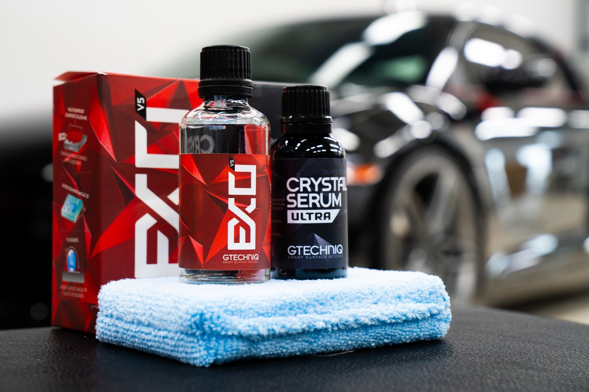 Car detailing products: red bottle