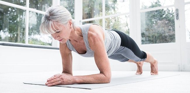 Woman holding a plank position.