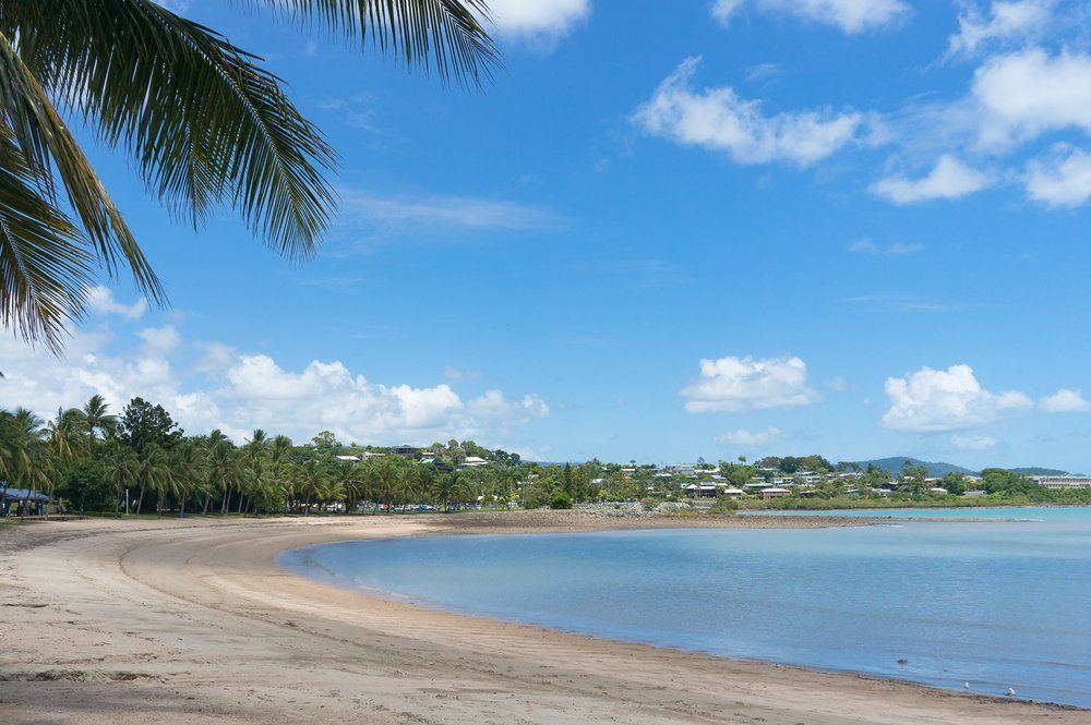 Airlie Beach on Sunny Day with Turquoise Blue Water — Whitsunday Drainage Contractors in Airlie Beach, QLD