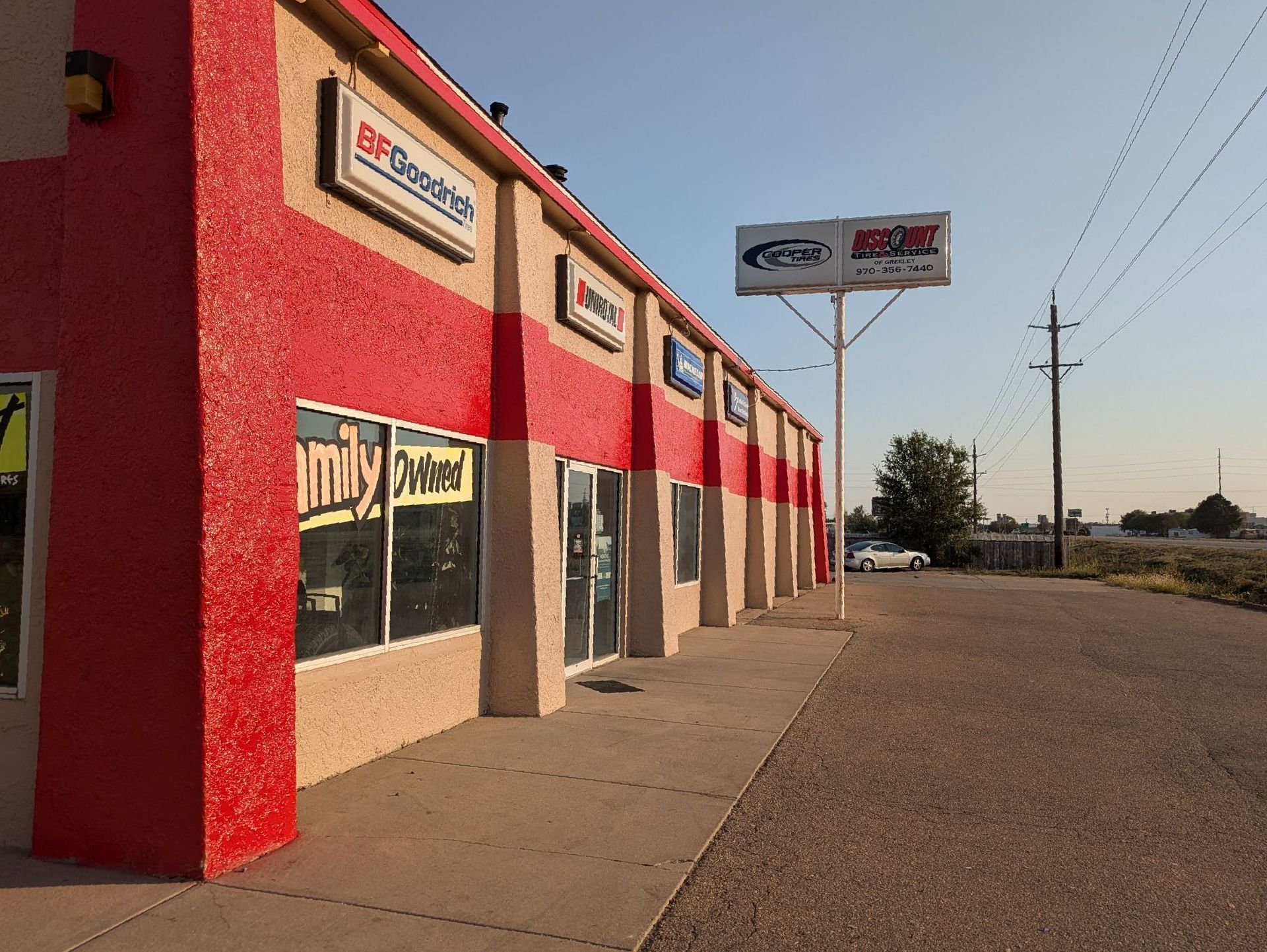 A red and tan building with a sign that says milwaukee