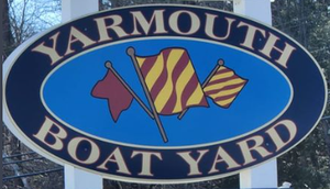 A sign that says yarmouth boat yard on it