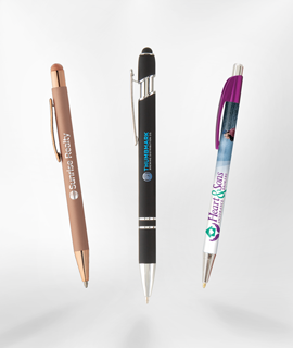 Three pens are sitting next to each other on a white surface.