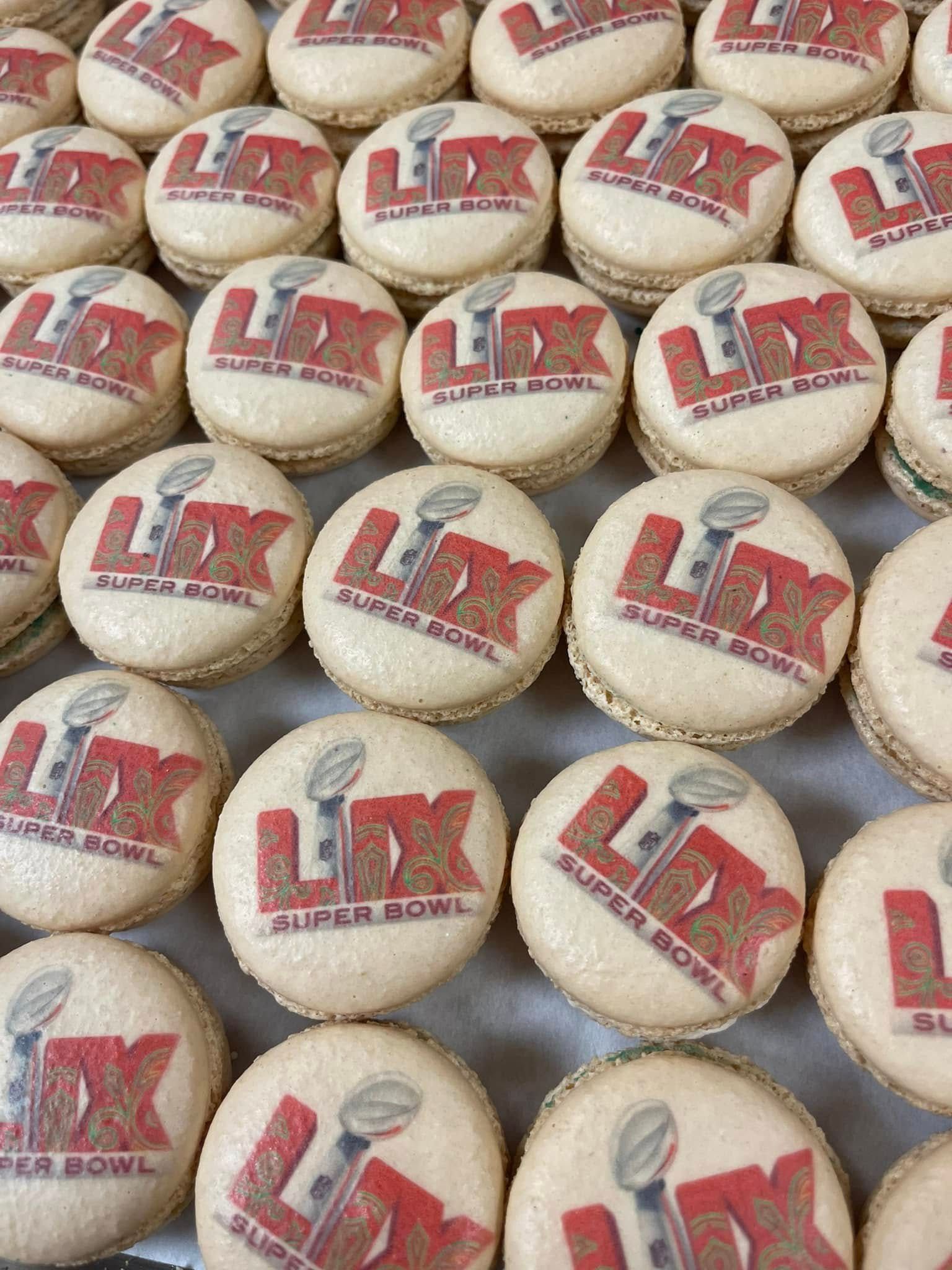 Macarons with Super Bowl LIX logo, red, white, and tan.