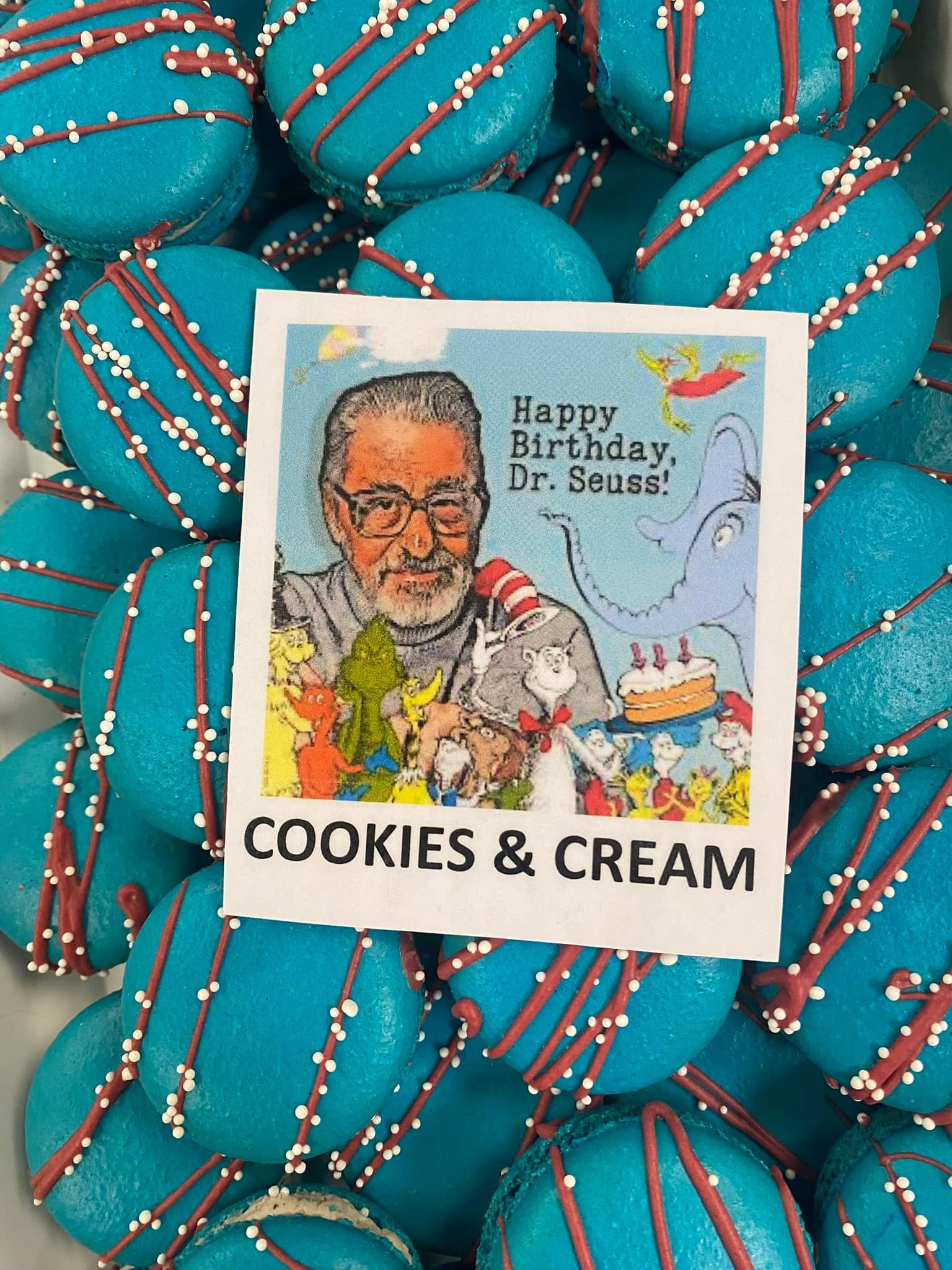Cookies and cream treats with a Dr. Seuss birthday card. Blue treats with red and white decorations.