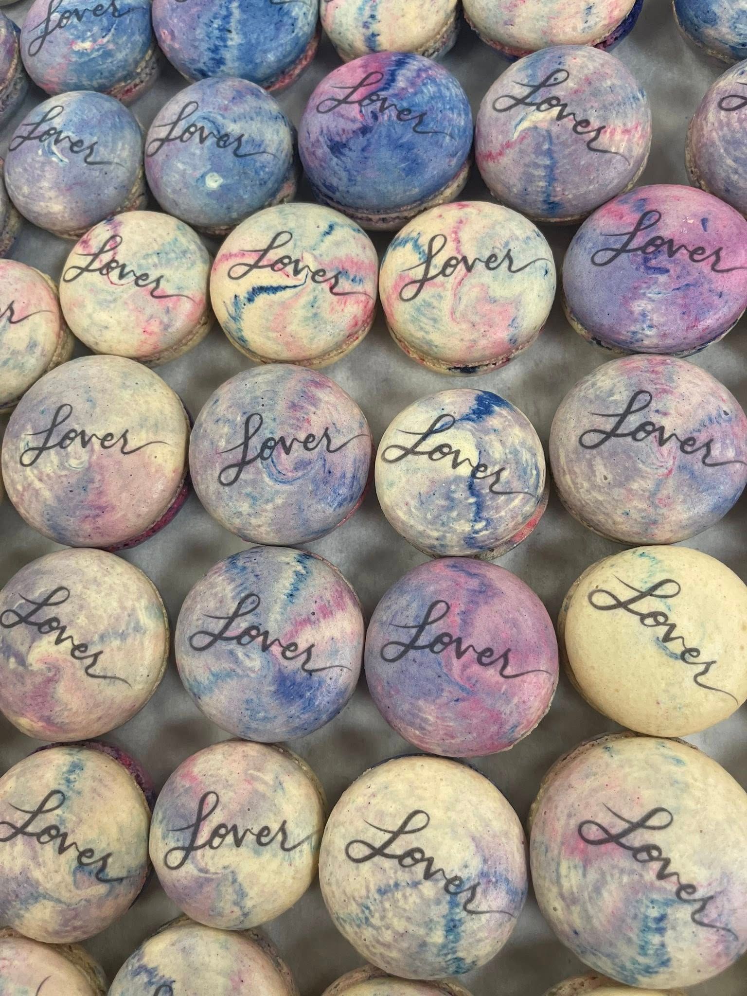 Macarons with marbled pastel frosting, 