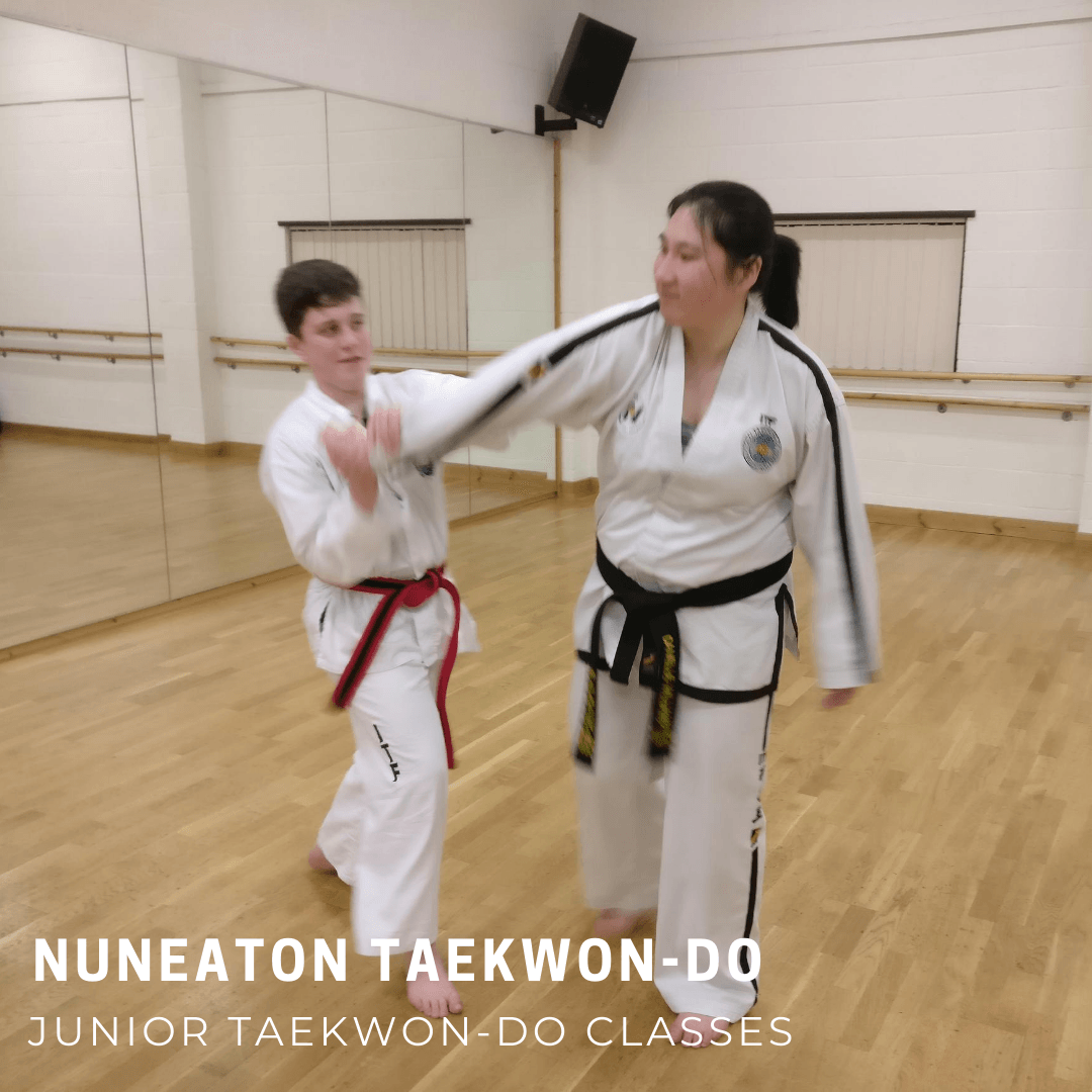 Red belt performing arm lock