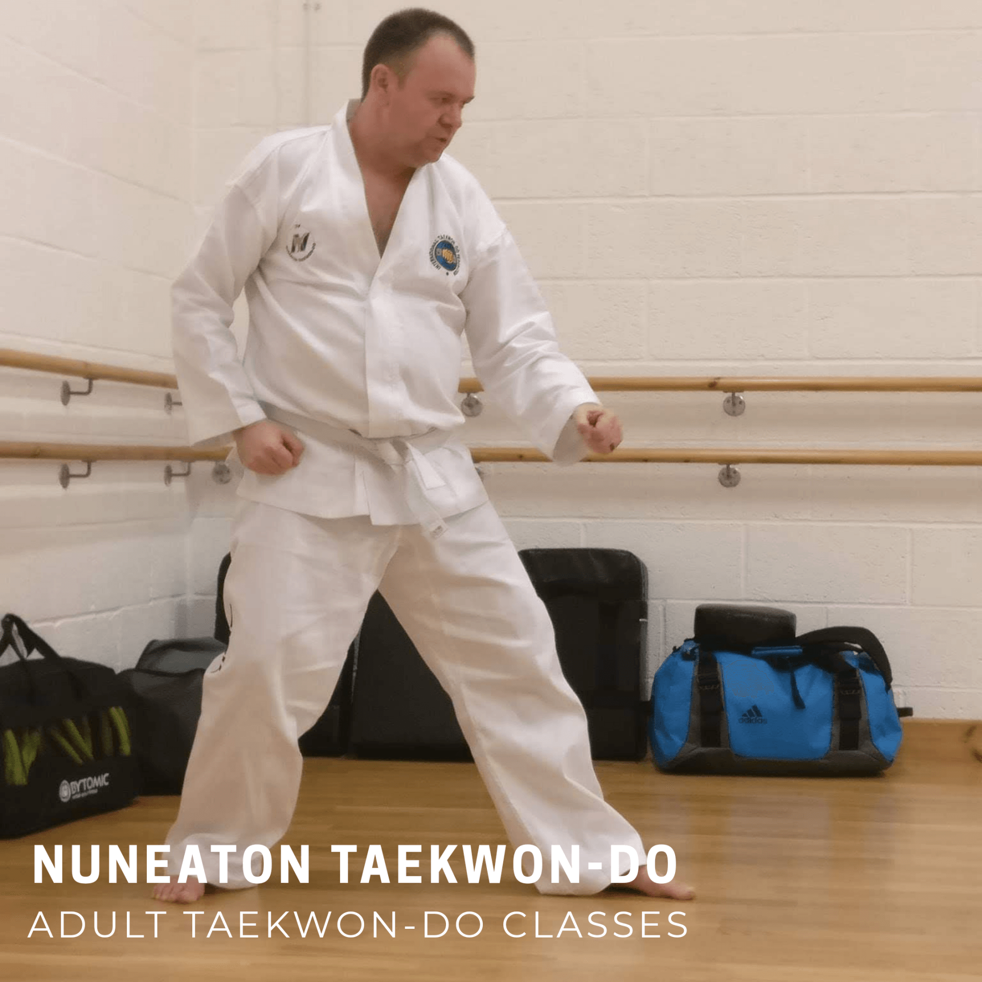 Adult Taekwondo student blocking