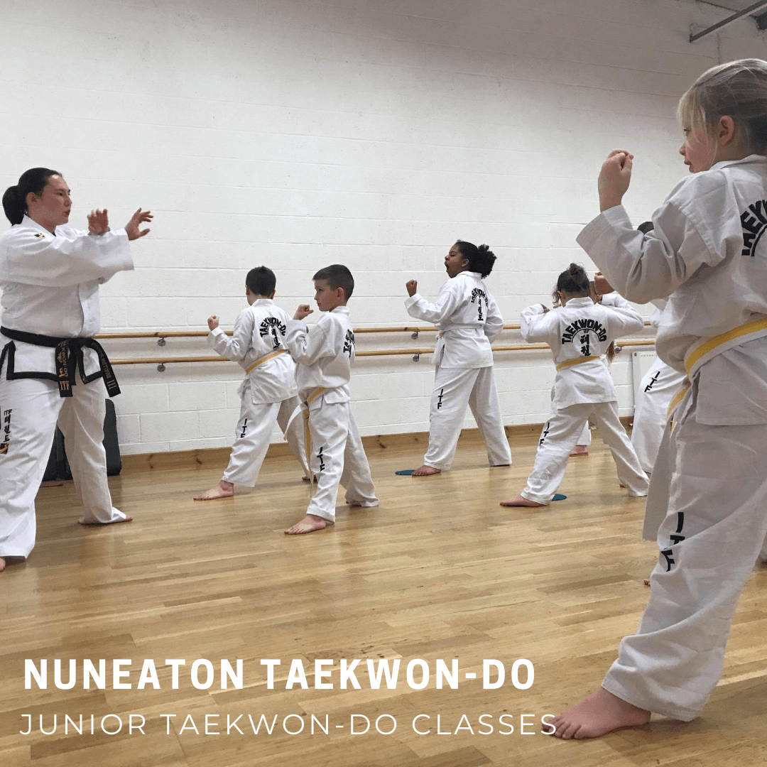 Taekwondo students learning in class