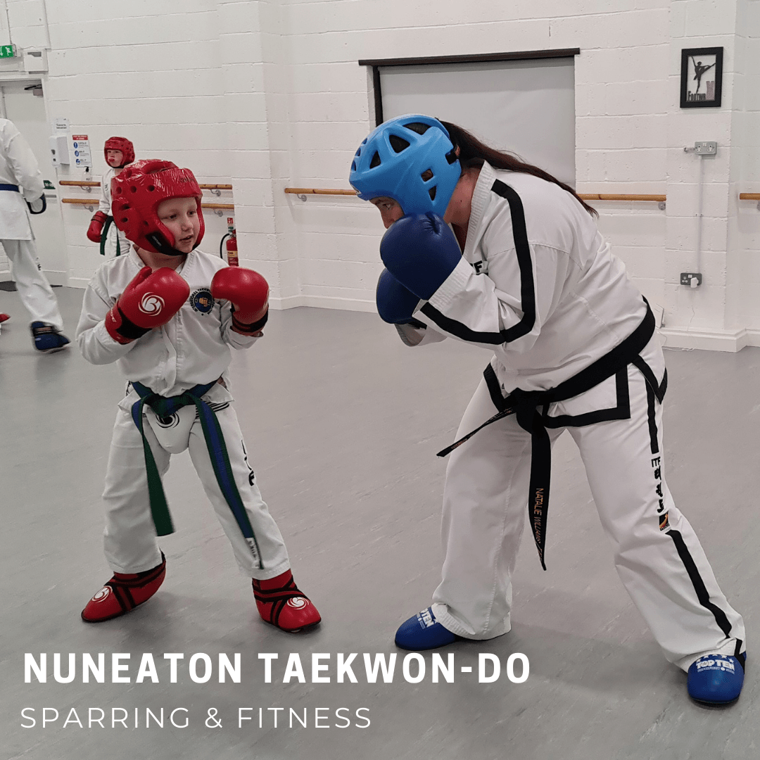 Adult and child sparring