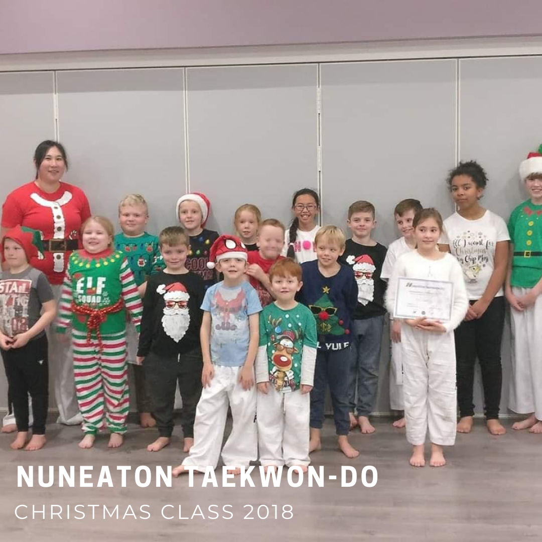 Children wearing Christmas jumper