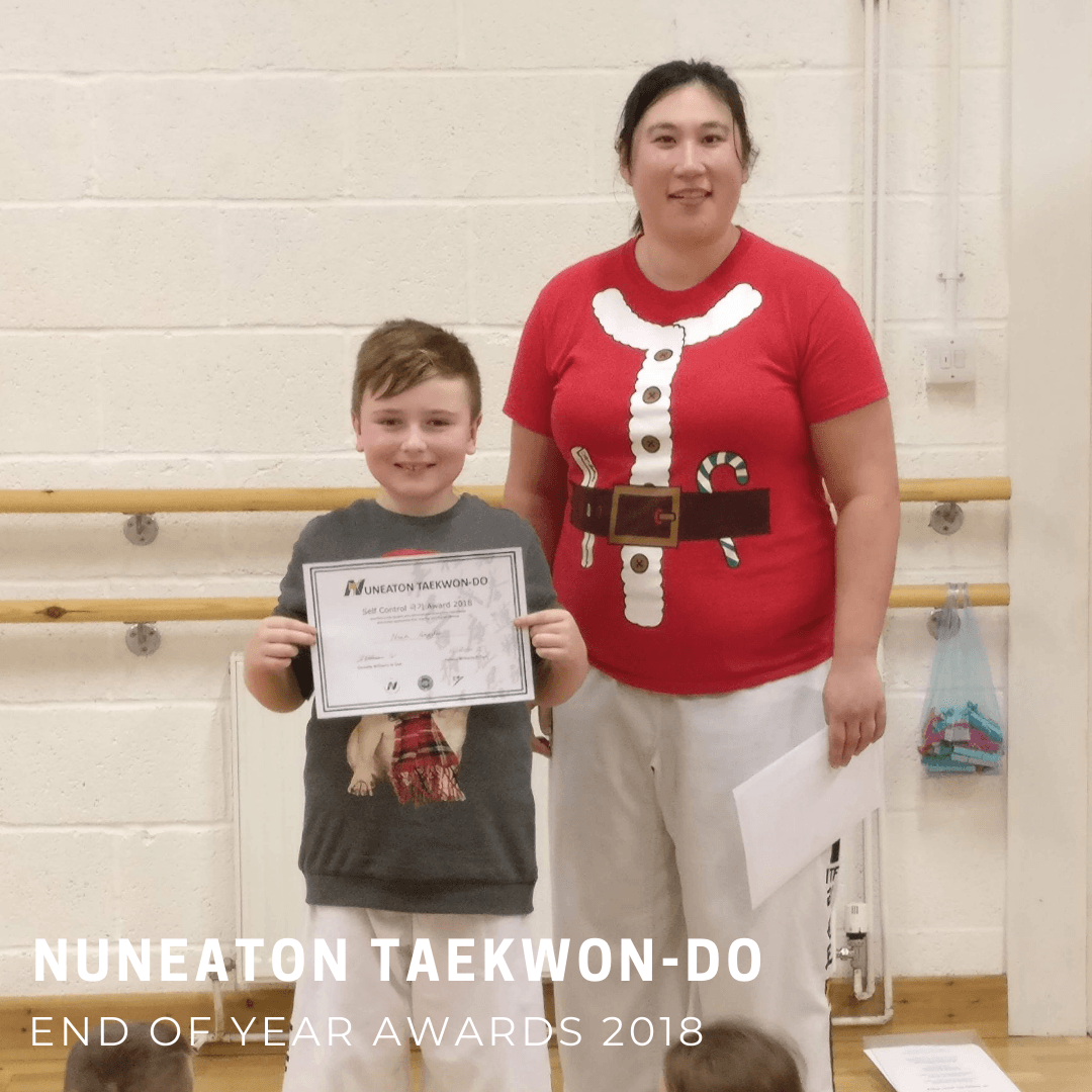 Martial arts boy with certificate