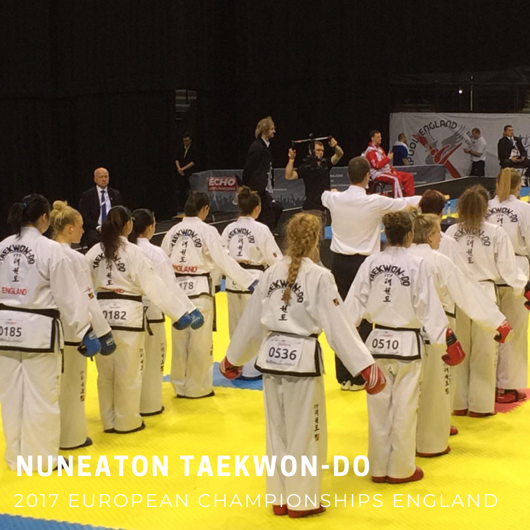 Female blackbelts lined up before match