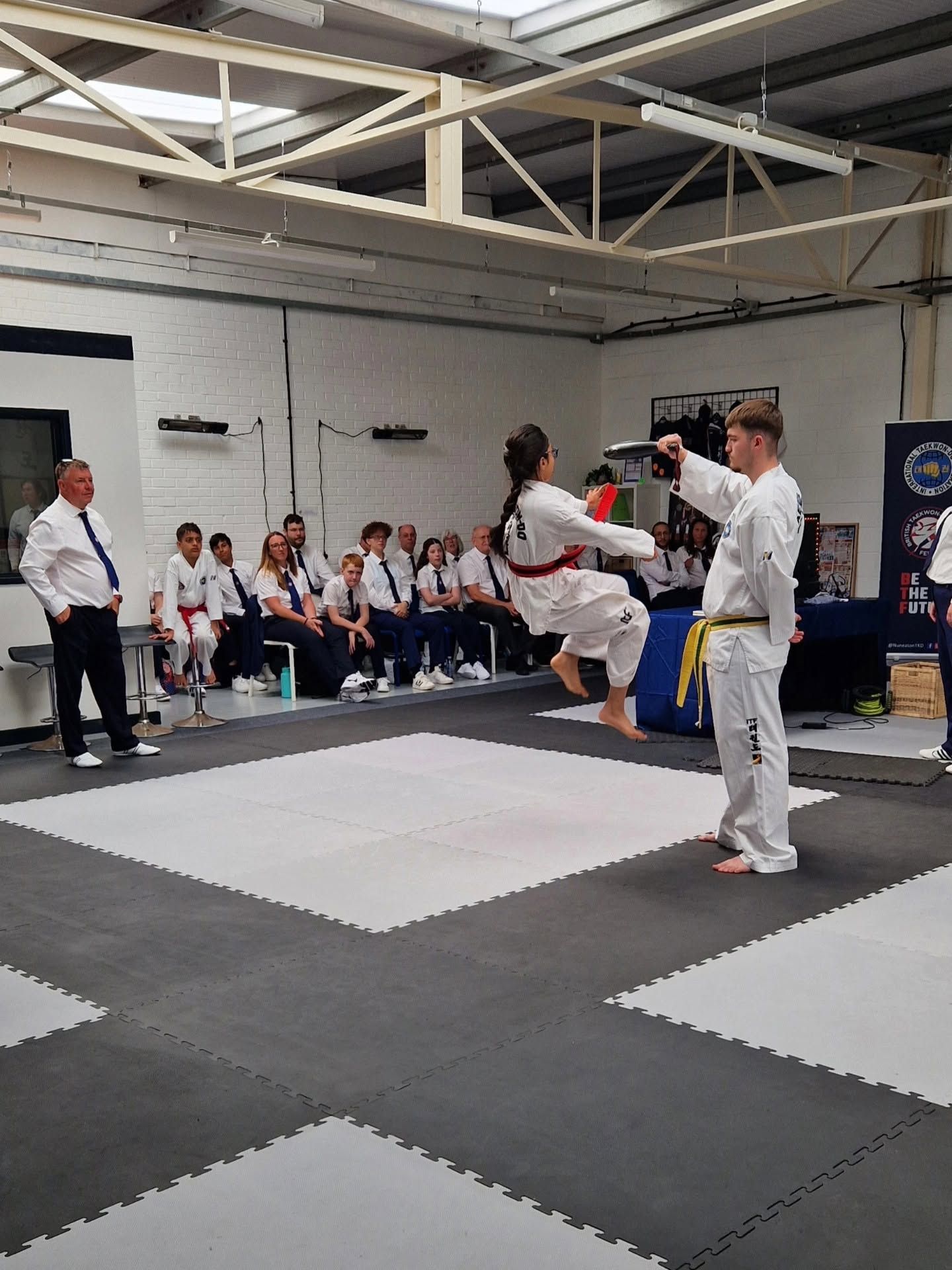 Taekwon-Do student showing a jumping kick