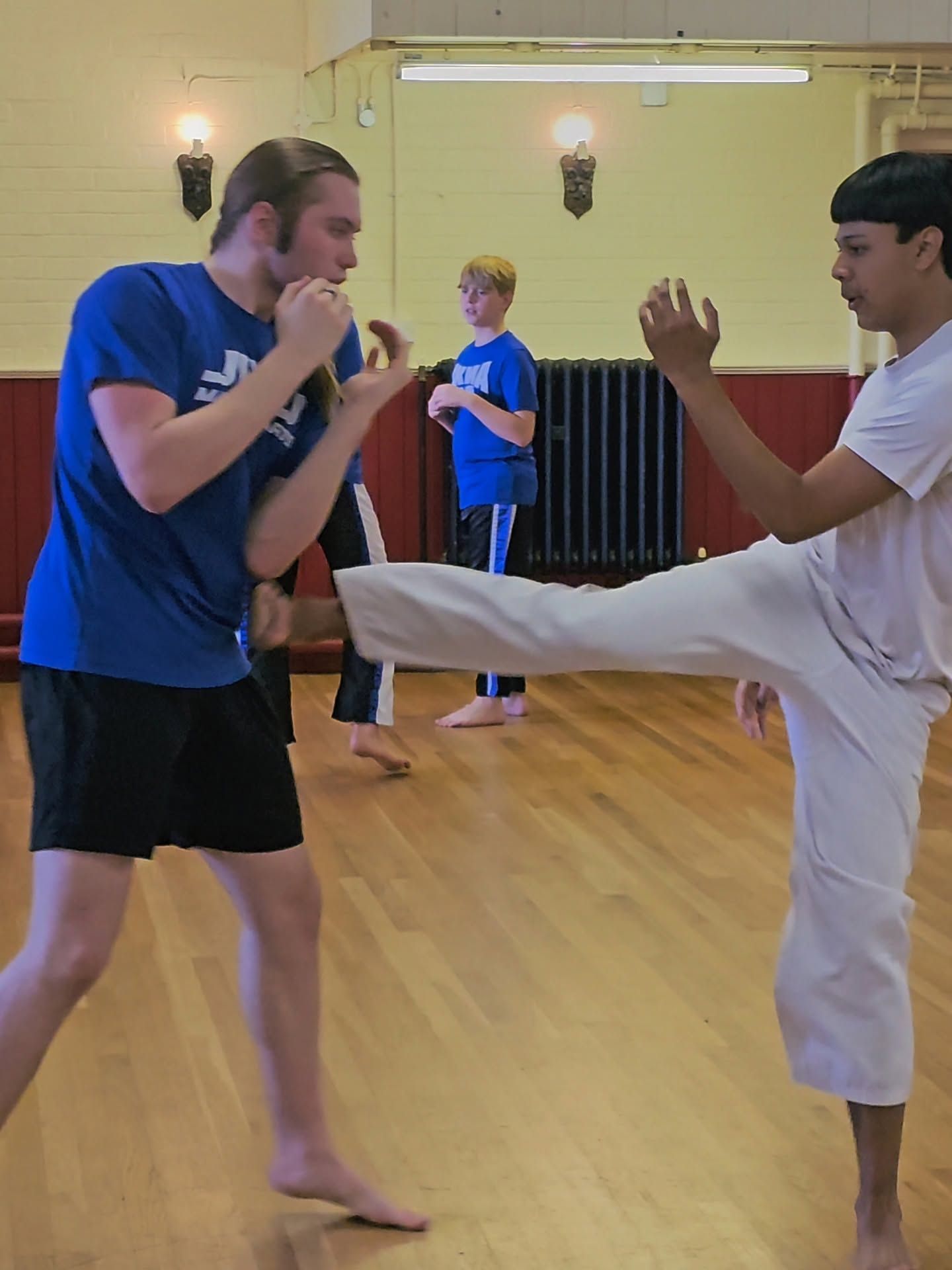Kickboxer throwing a front kick