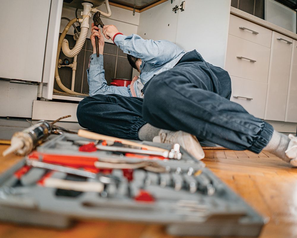 Plumber Repairing Sink Drain — Cinnaminson, NJ — MD Plumbing