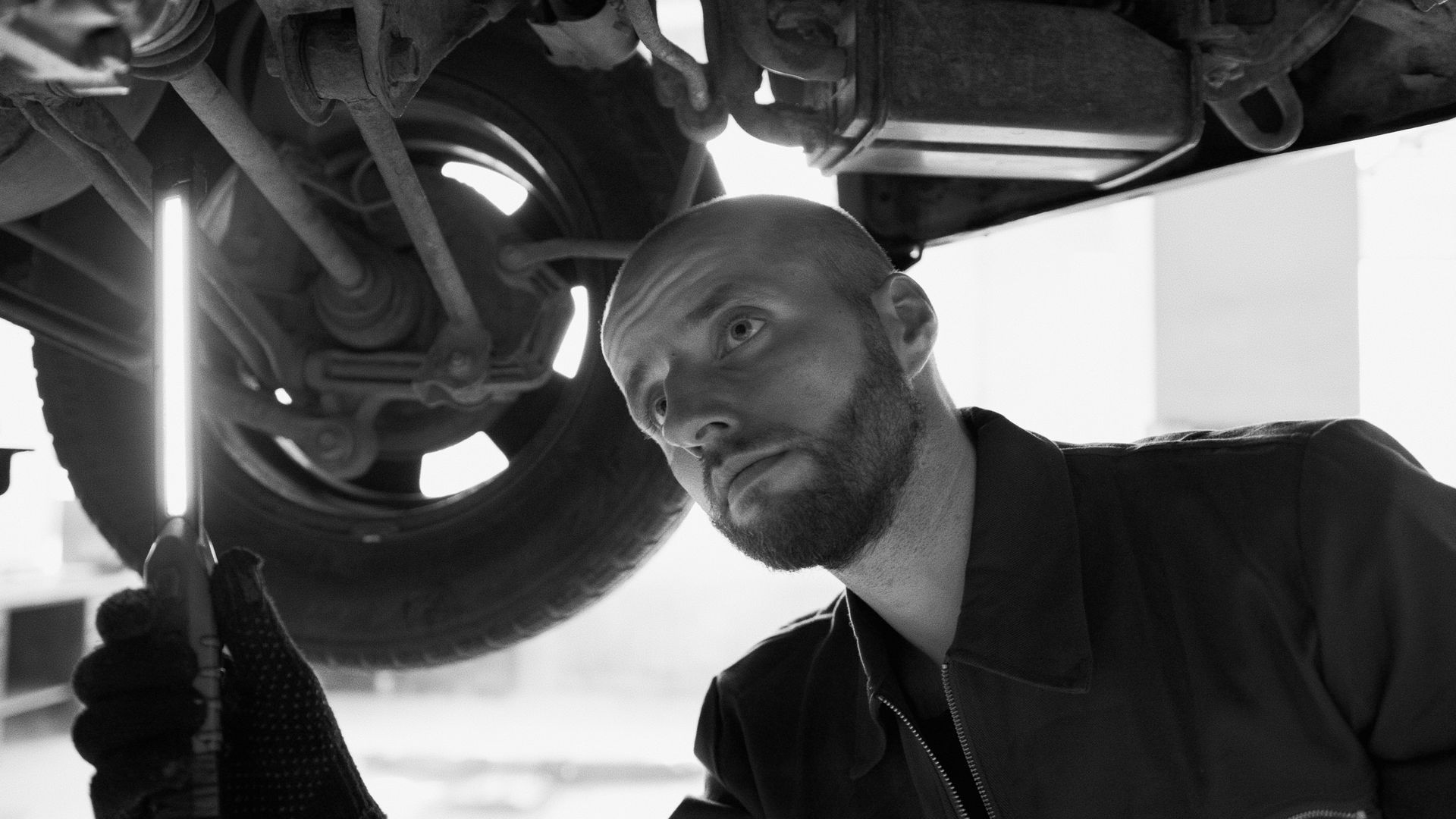 Kumeu Car Services repair a Yellow vintage car