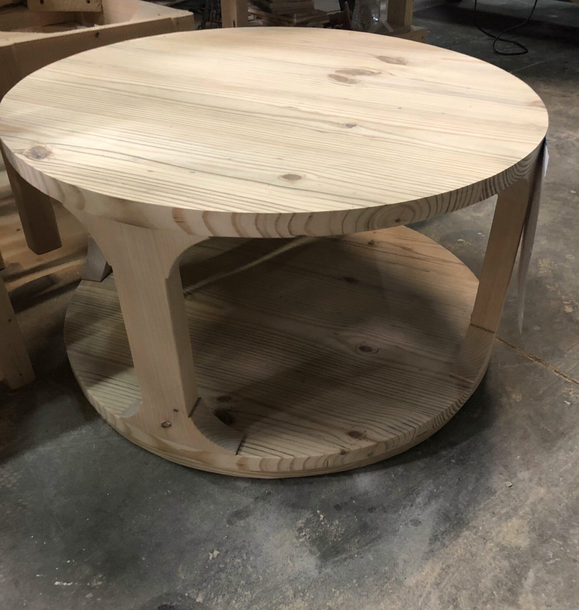 round wood table being built