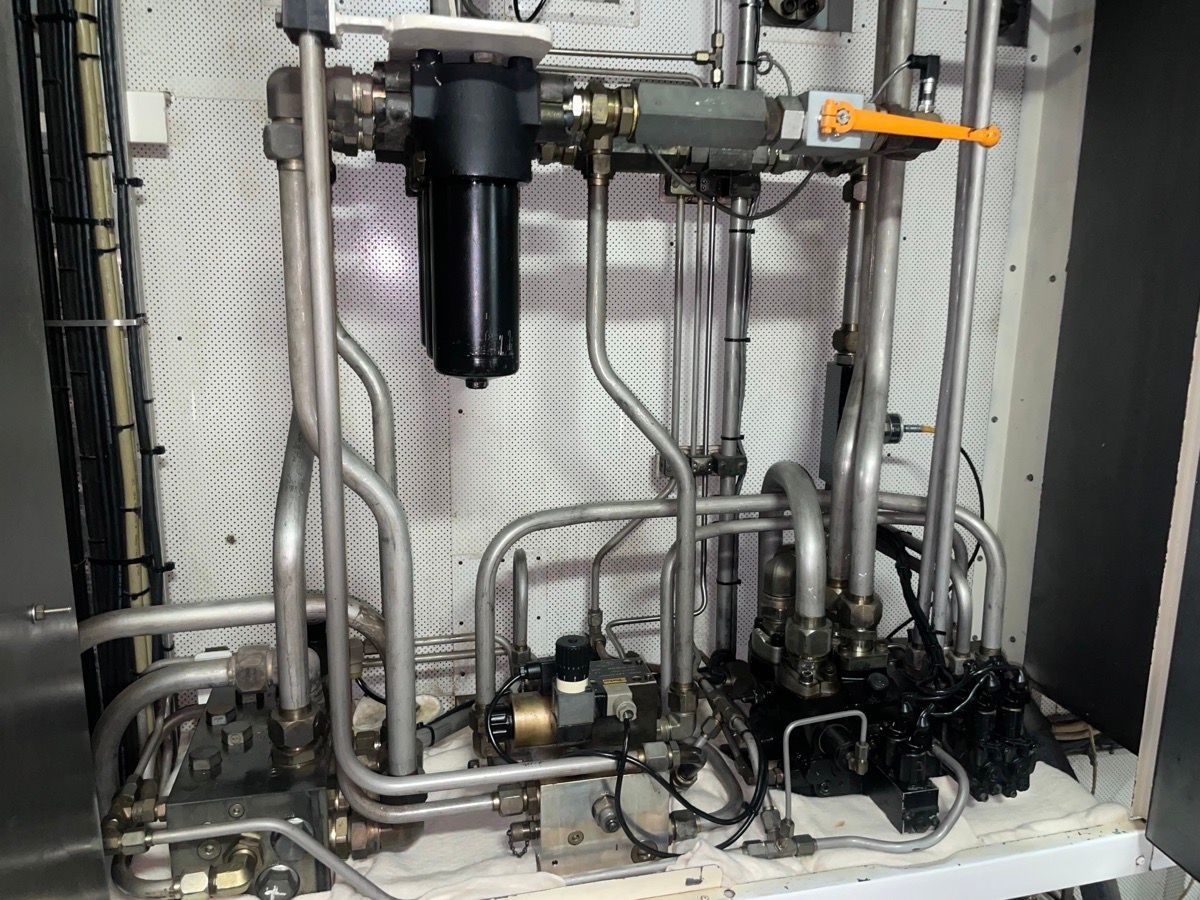 Qualified Mechanic Repairing Hydraulic Pumps — Coastal Hydraulics & Engineering Pty Ltd In Bungalow, QLD