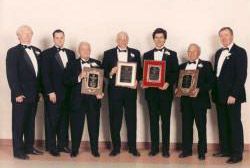 1996 Former Chapter VP David Huntington, NFF VP Dave Torromeo. Official Award Winner Vin Reilly, Coach of the Year Joe Benanto Shelton, Distinguished American Tim Shriver, President International Special Olympics, Merit Award Winner Sabby Frinzi, Chapter President Bill O’ Brien
