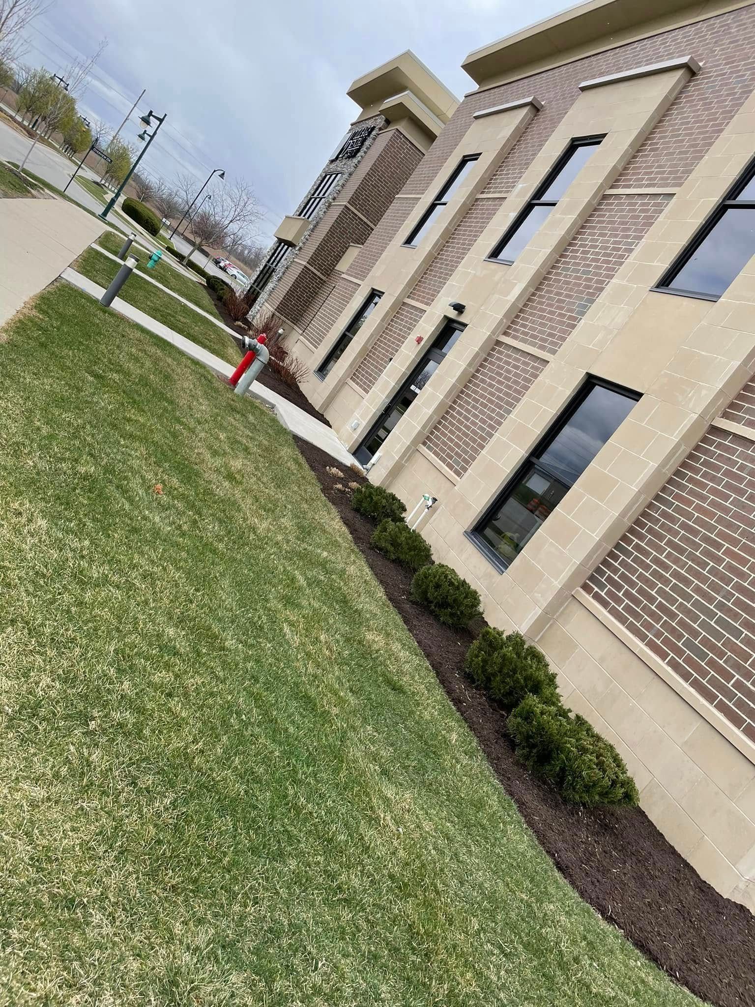 A large brick building with a lot of windows