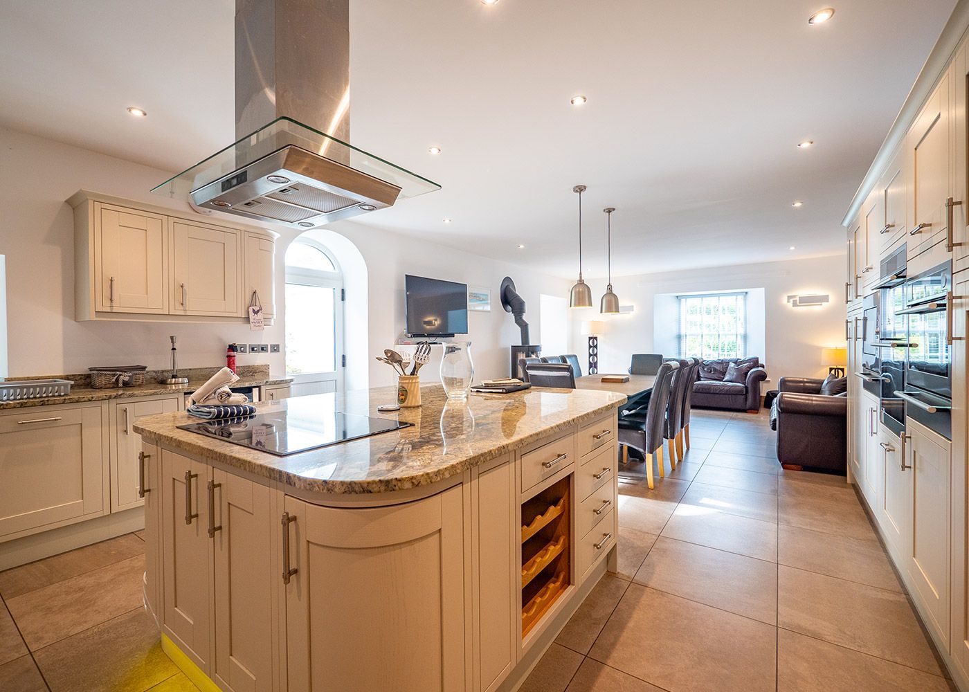 There is a large island in the middle of the kitchen.