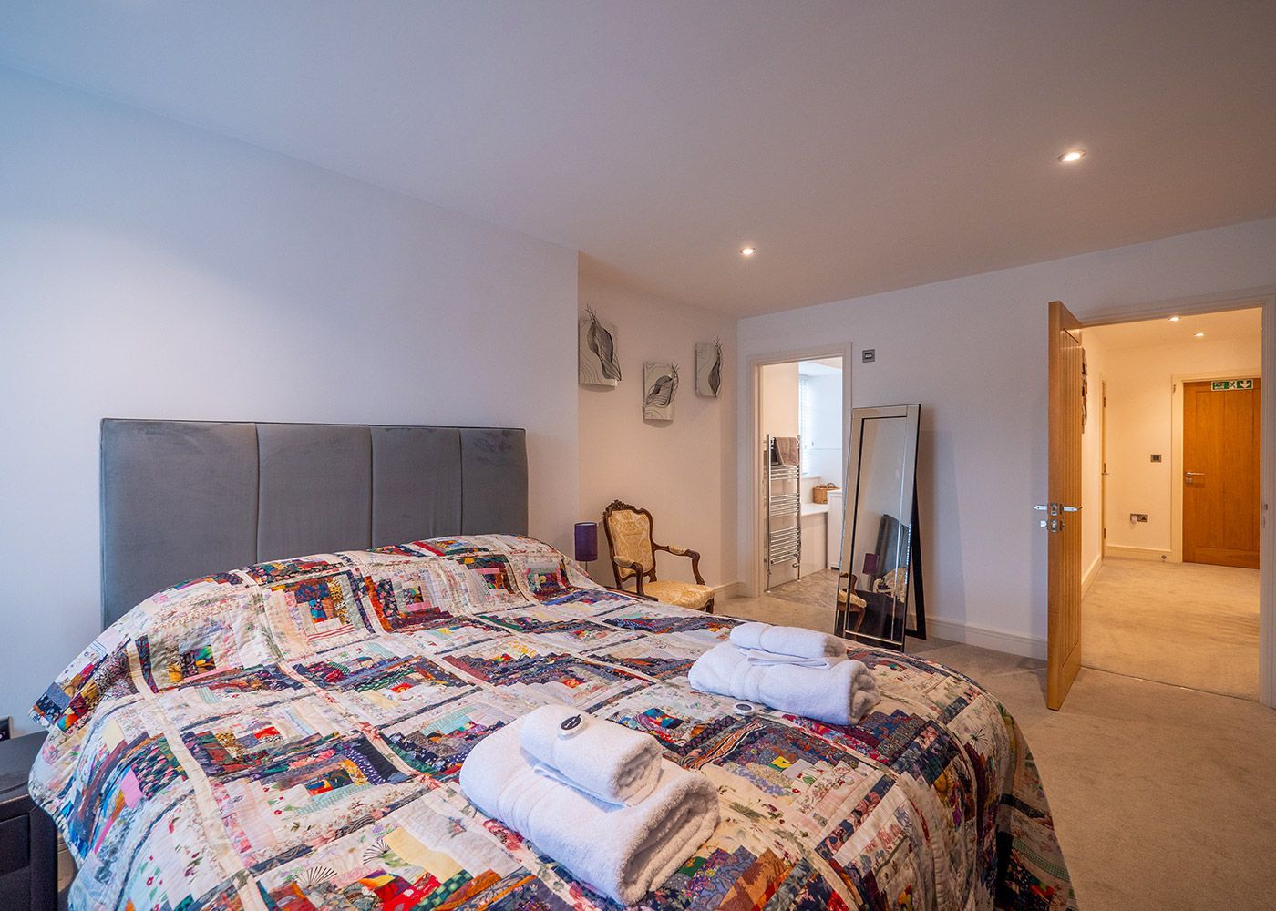 There is a large bed in the middle of the room.