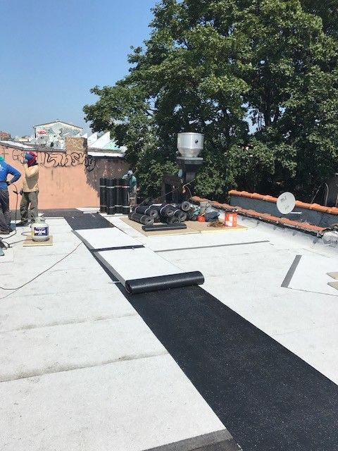 A roof with a satellite dish on it
