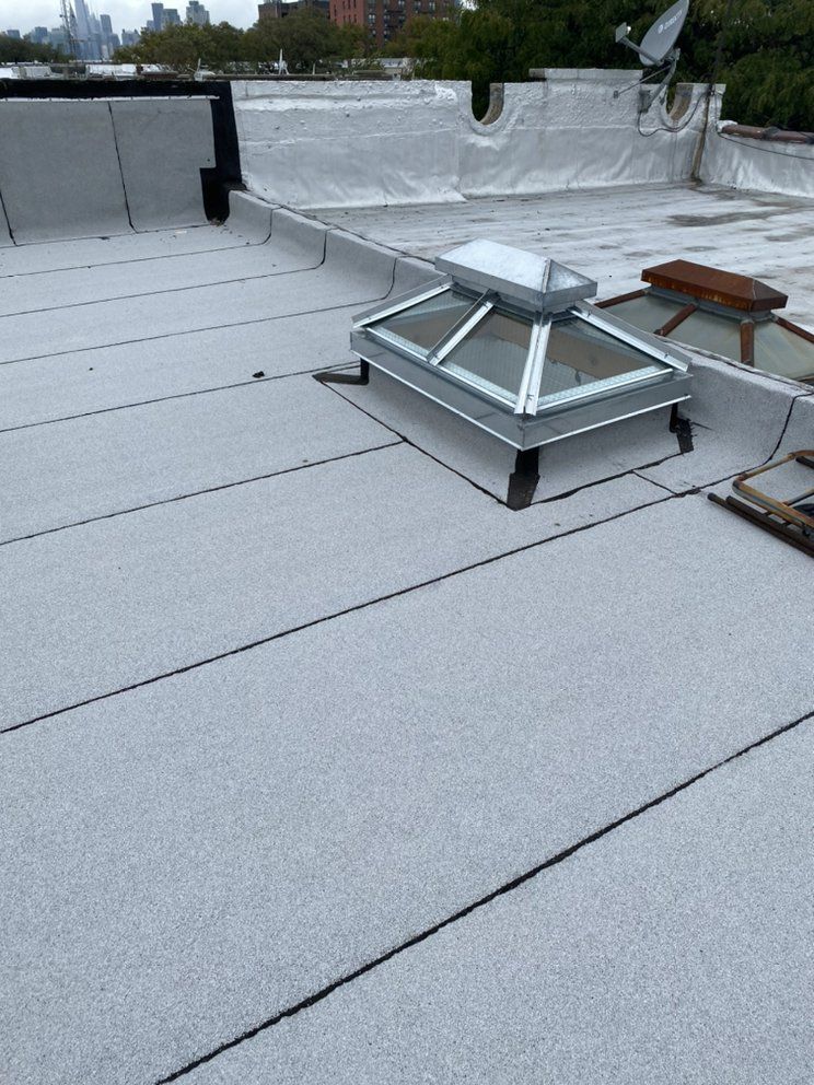 There is a skylight on the roof of a building.