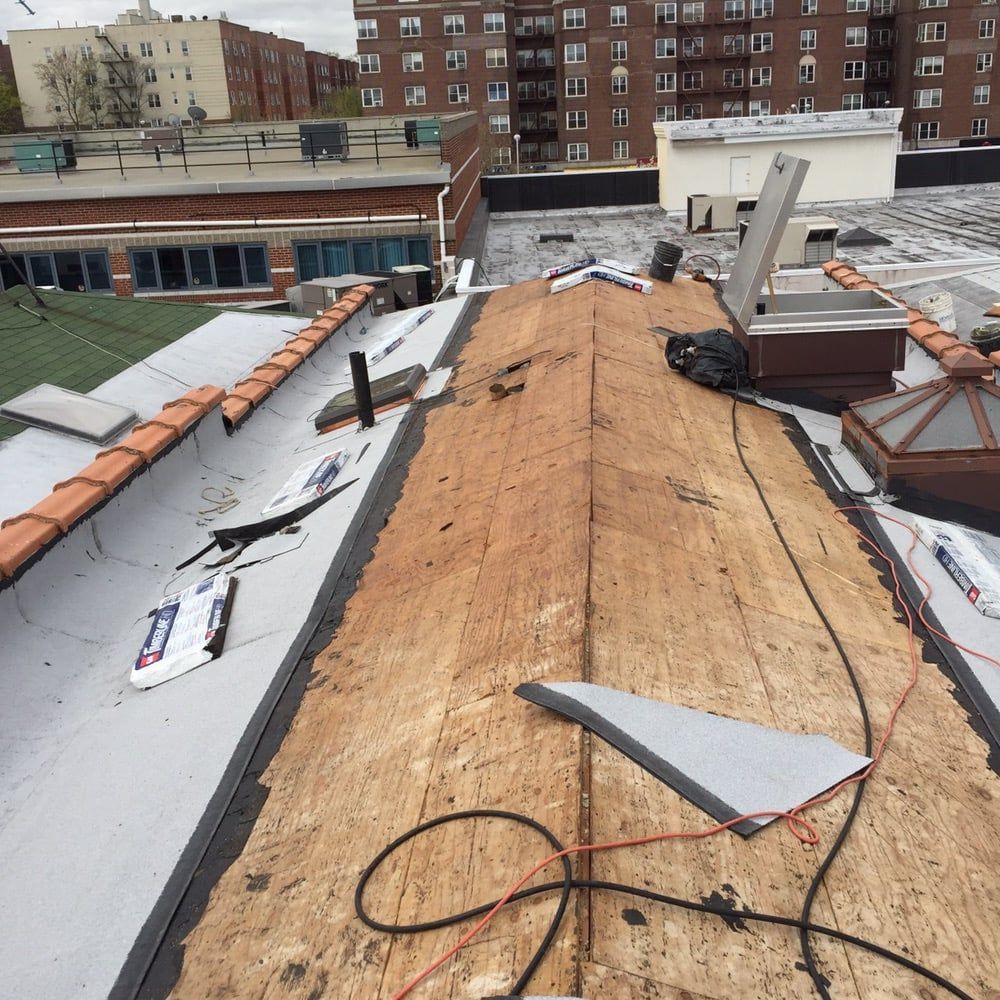 A roof with a few pieces of wood on it