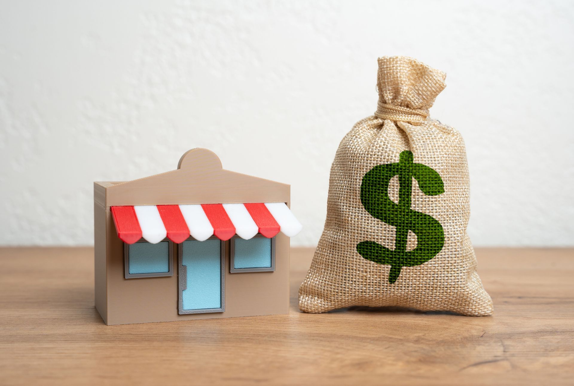 Canadian currency overlaid with blue stock market graphs.