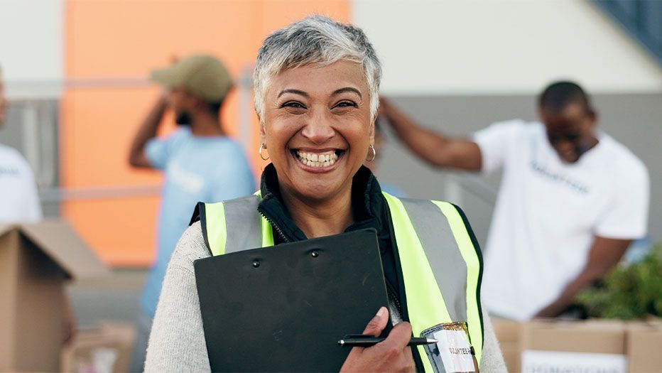 Woman smiling with clipboard