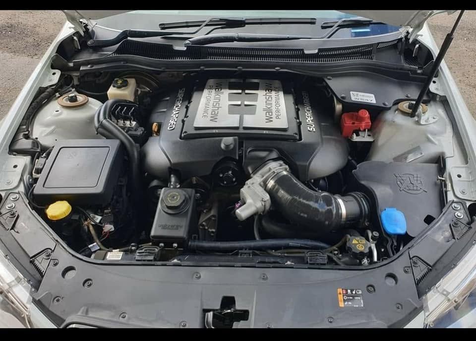 The Engine of a Silver Car With the Hood Open — Powerhouse Auto Repairs Bundaberg in Bundaberg East, QLD